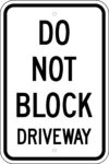 G 21 do not block driveway sign