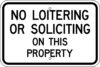 G 94 no loitering or soliciting on this property sign